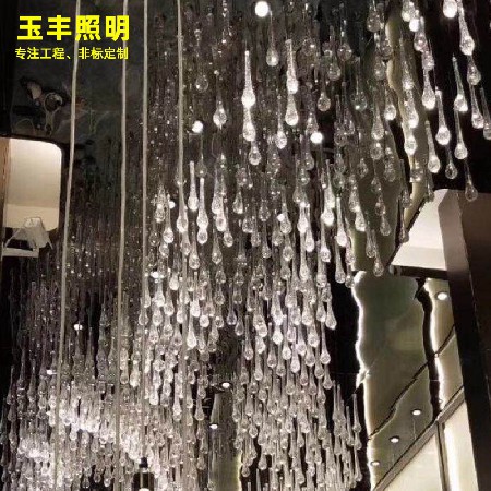 Glass decorative chandelier in hotel lobby